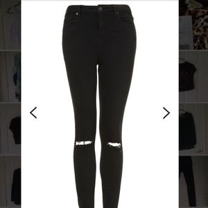 Topshop: Black Ripped Jamie Jeans